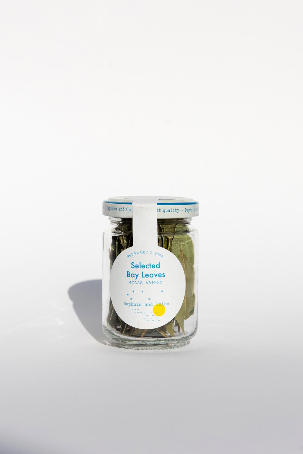 Daphnis and Chloe Selected Bay Leaves Glass Jar Front White BG For WEB